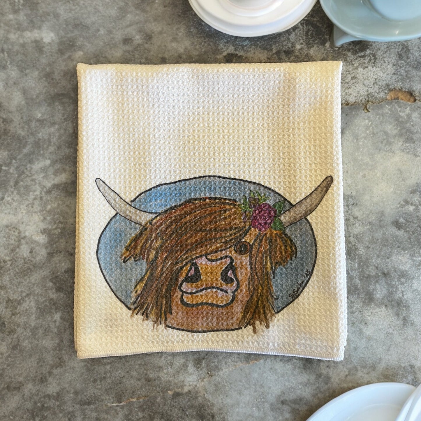Microfiber waffle knit kitchen dishtowel with Highland Coo