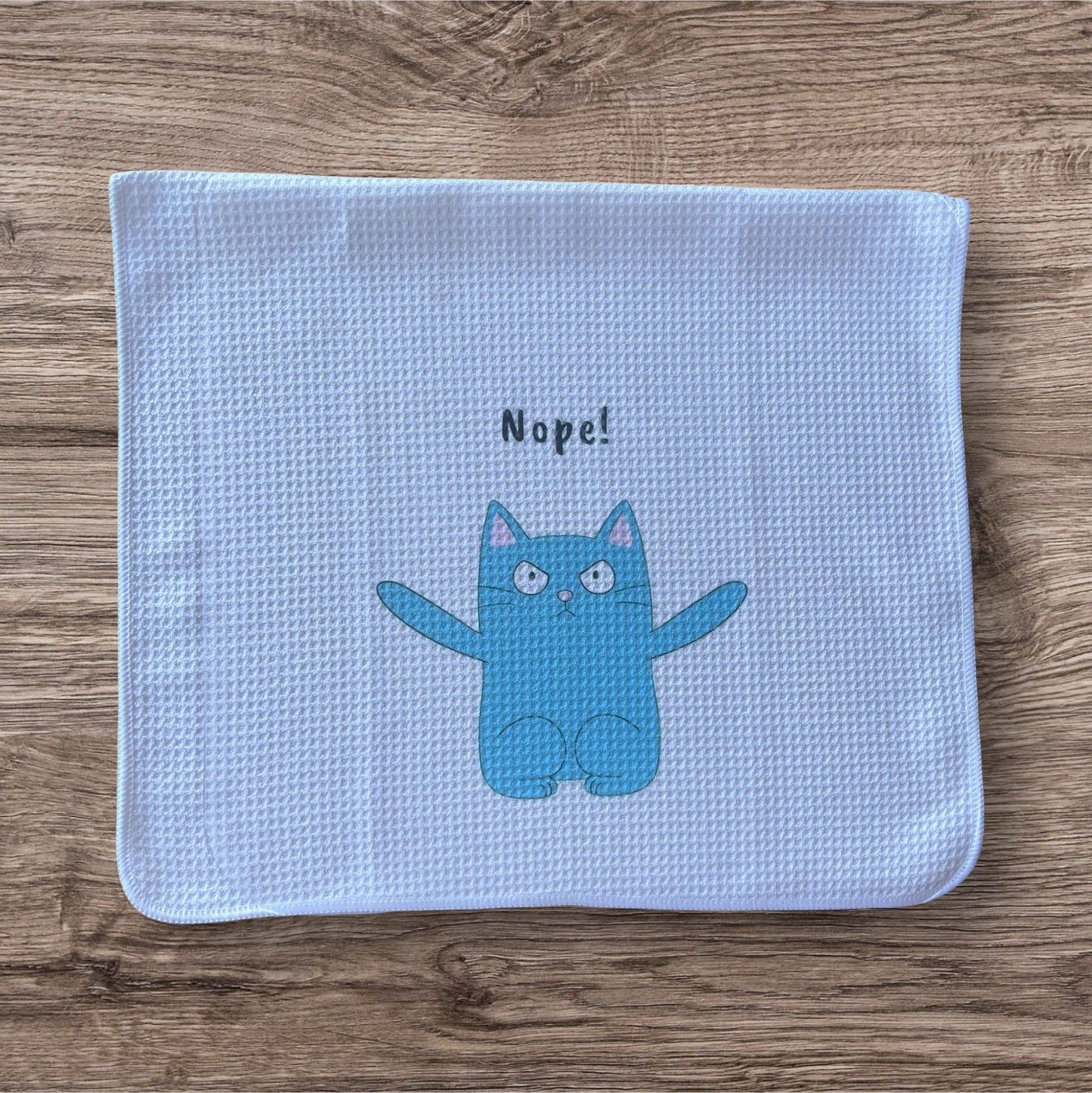 Nope! Cat dish towel