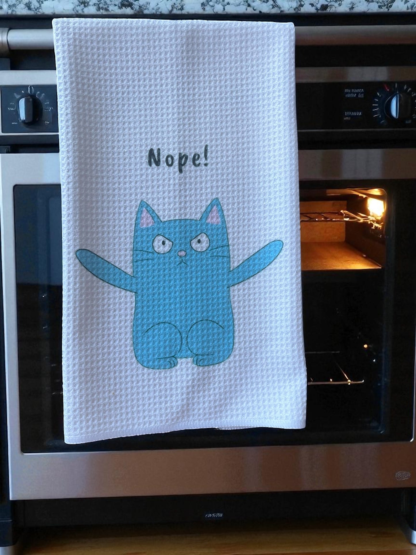 Nope! Cat dish towel